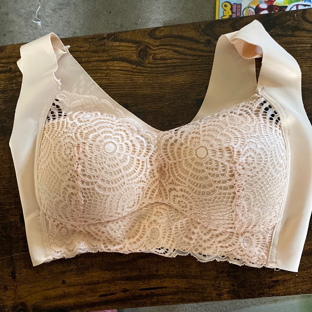 Nude/peach colored bralette.